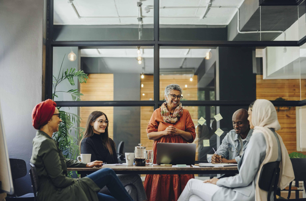 happy, diverse UK workplace team